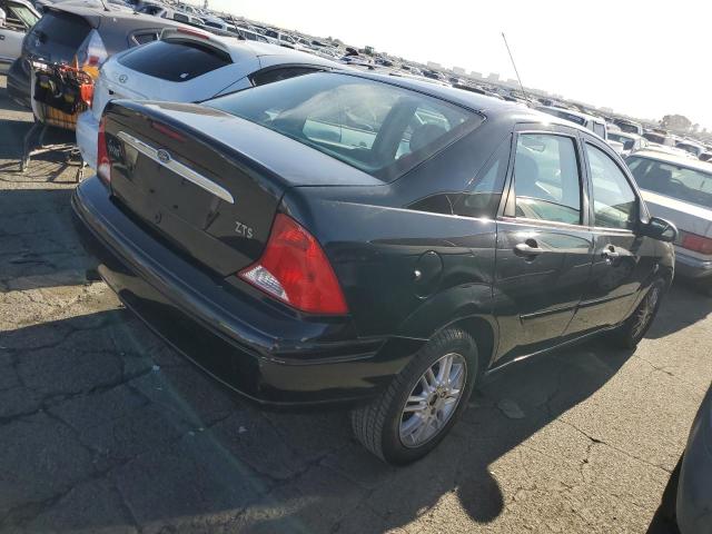 Photo 2 VIN: 1FAFP3835YW407090 - FORD FOCUS 