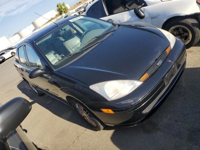 Photo 3 VIN: 1FAFP3835YW407090 - FORD FOCUS 