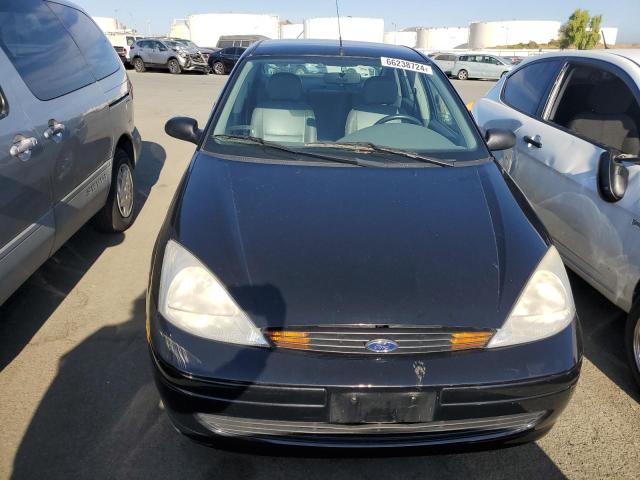 Photo 4 VIN: 1FAFP3835YW407090 - FORD FOCUS 