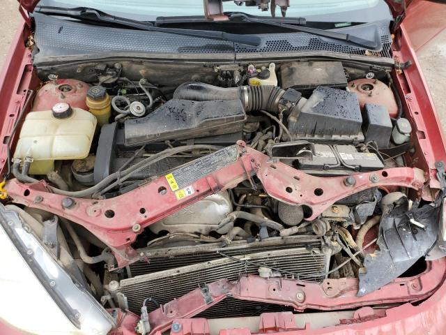 Photo 10 VIN: 1FAFP383XYW160729 - FORD FOCUS 