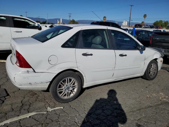 Photo 2 VIN: 1FAFP383XYW400555 - FORD FOCUS 