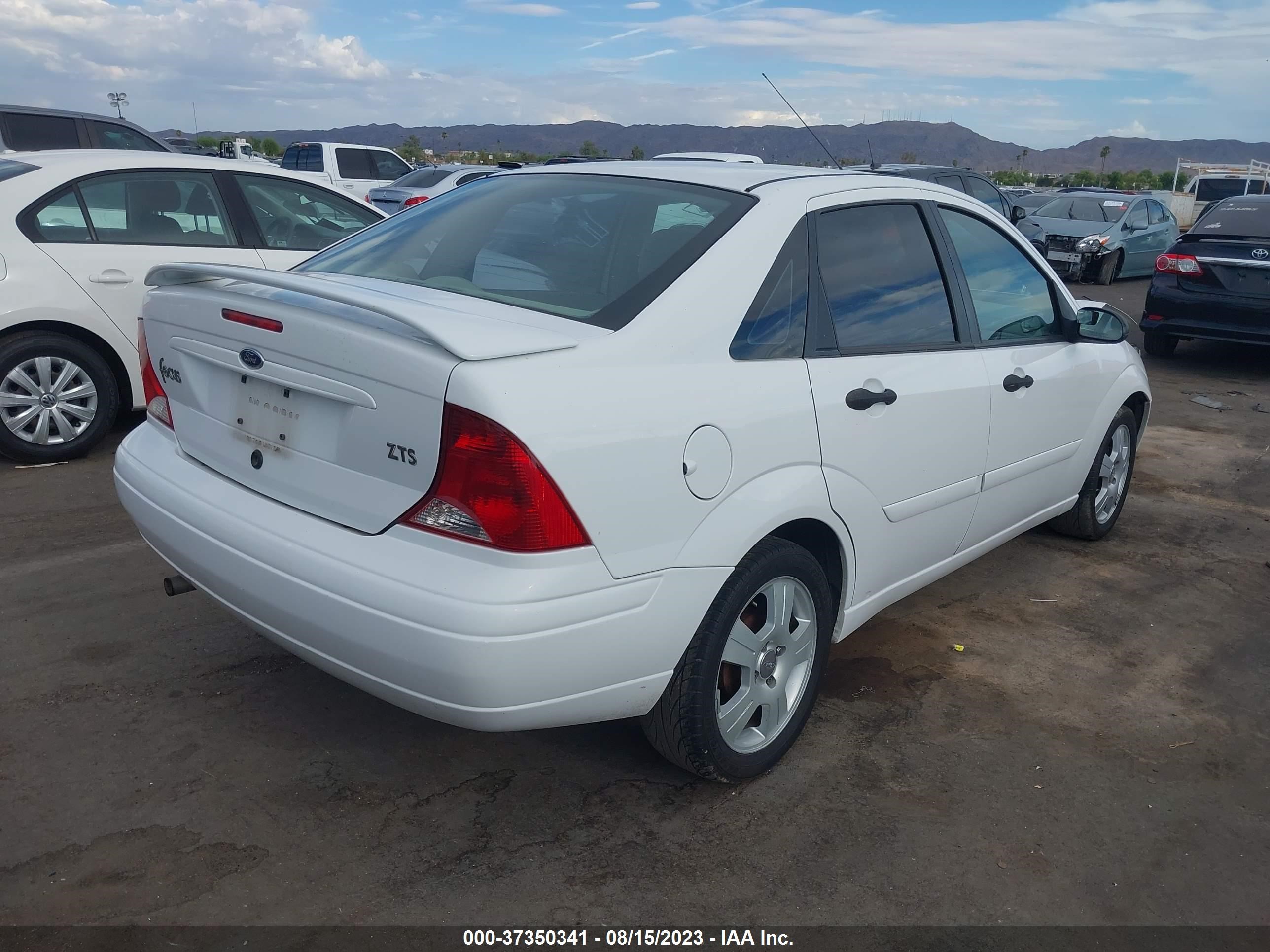 Photo 3 VIN: 1FAFP38Z03W277023 - FORD FOCUS 