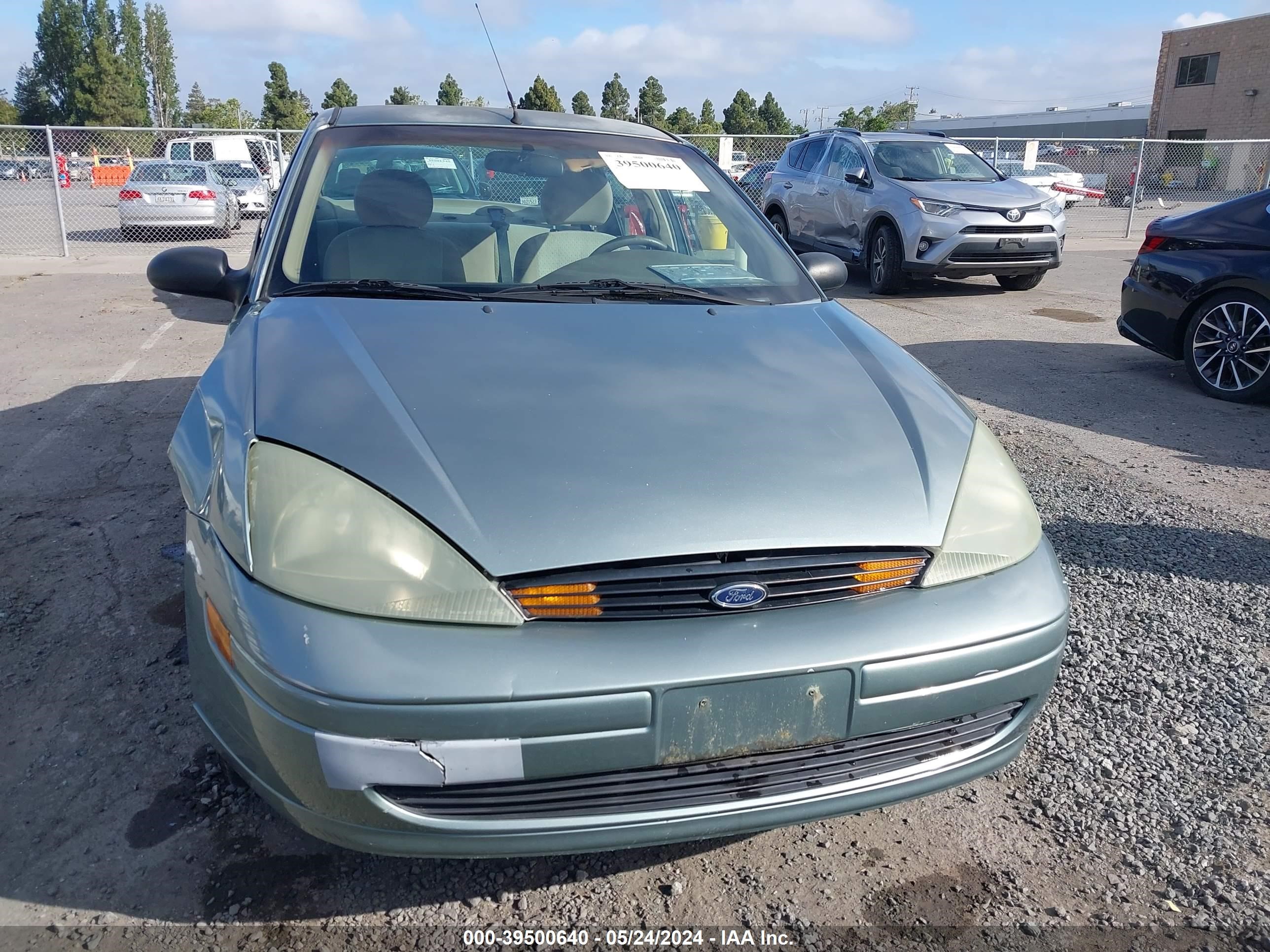 Photo 11 VIN: 1FAFP38Z64W200514 - FORD FOCUS 