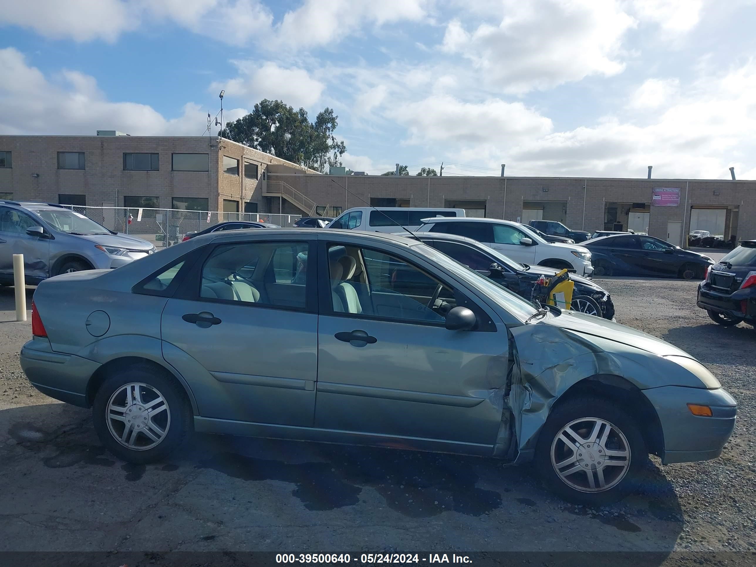 Photo 12 VIN: 1FAFP38Z64W200514 - FORD FOCUS 