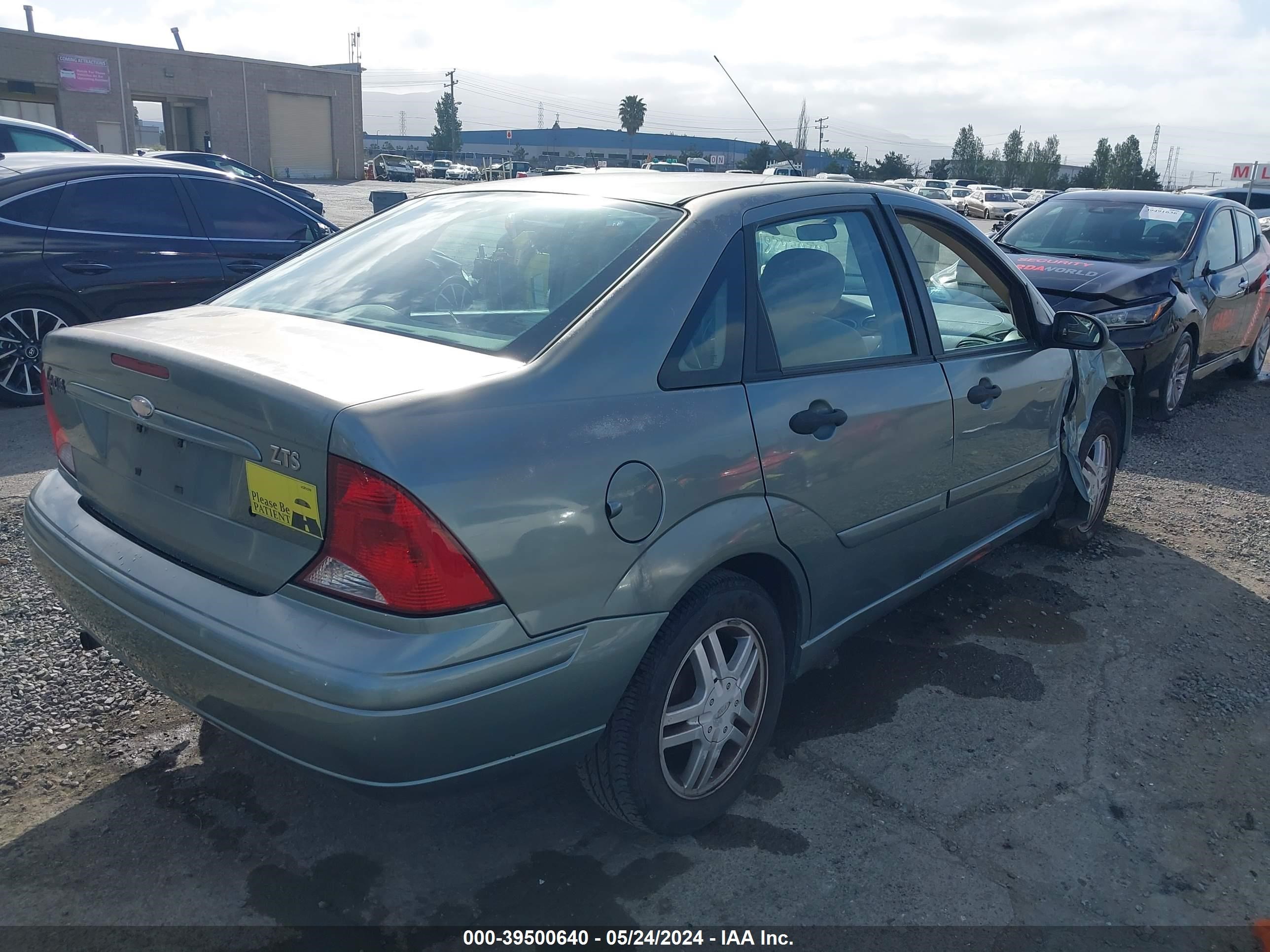 Photo 3 VIN: 1FAFP38Z64W200514 - FORD FOCUS 