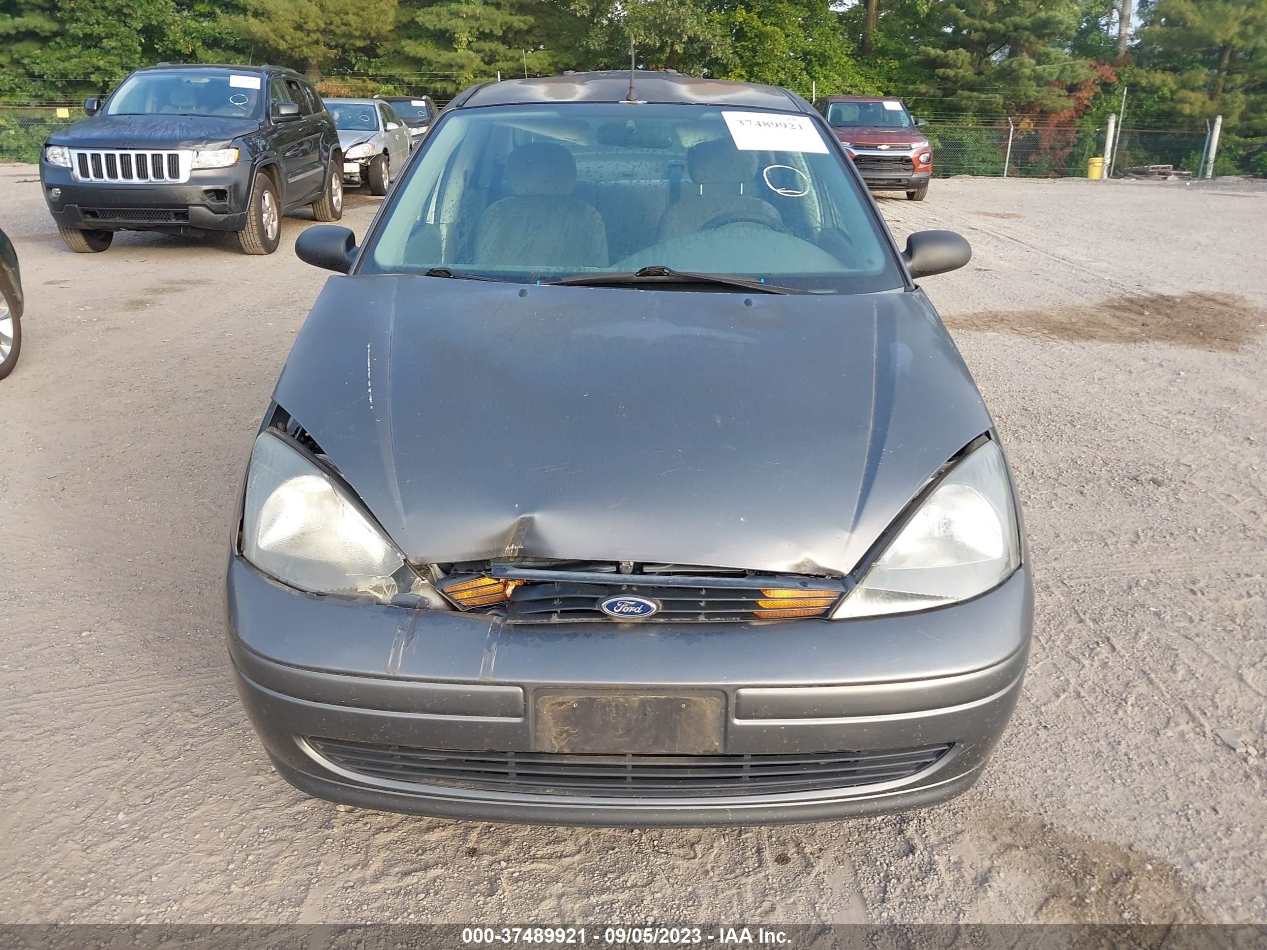 Photo 5 VIN: 1FAFP38ZX4W171759 - FORD FOCUS 