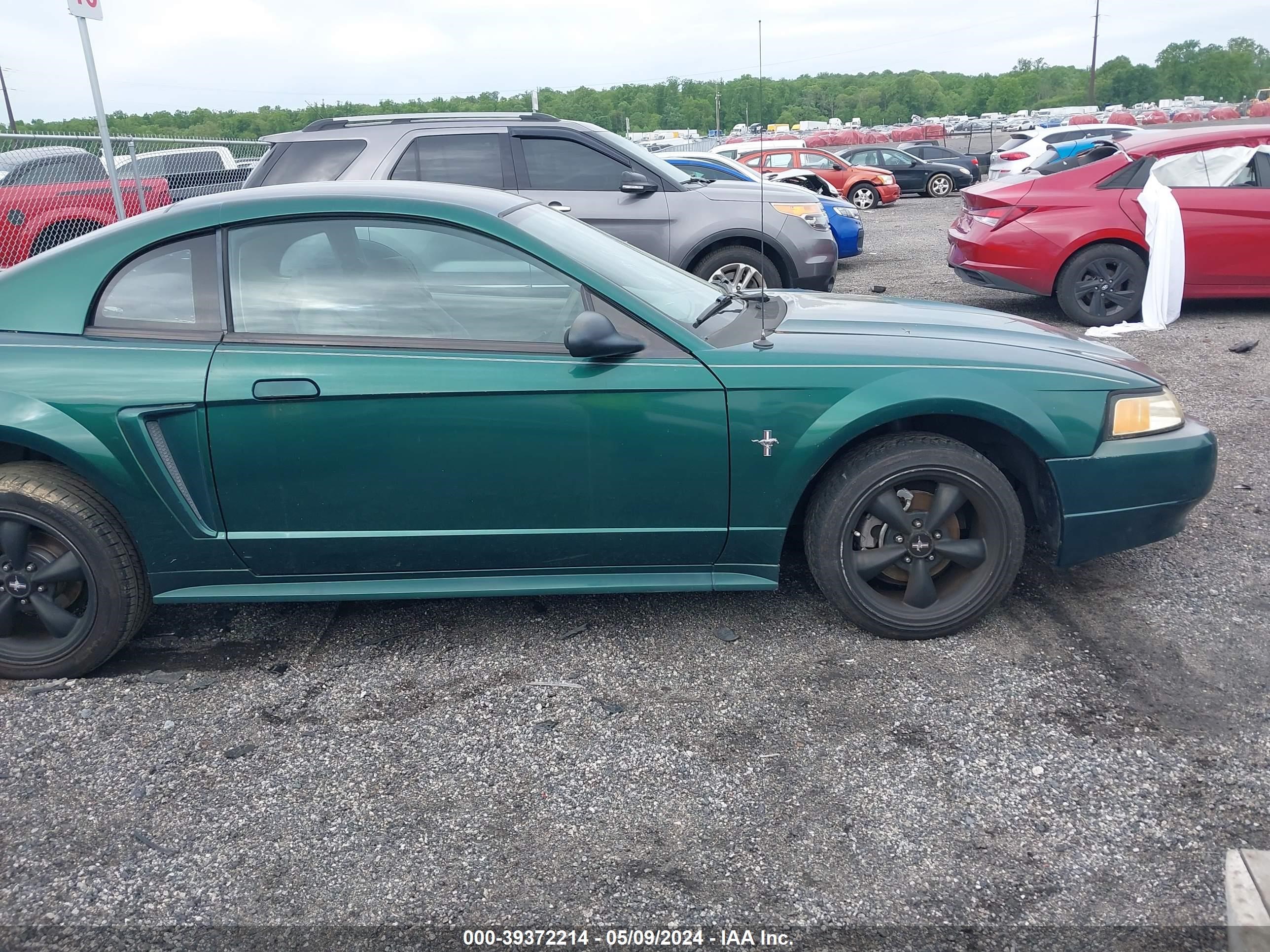 Photo 11 VIN: 1FAFP40471F131219 - FORD MUSTANG 