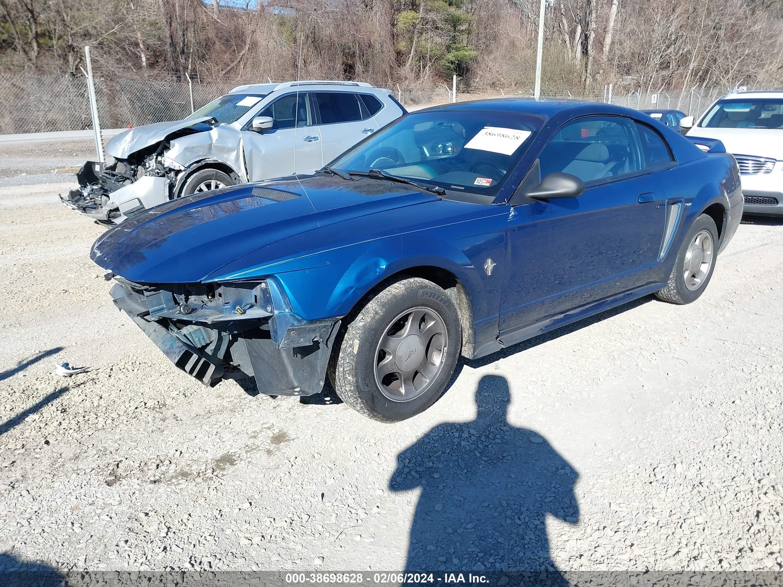 Photo 1 VIN: 1FAFP4047YF137189 - FORD MUSTANG 