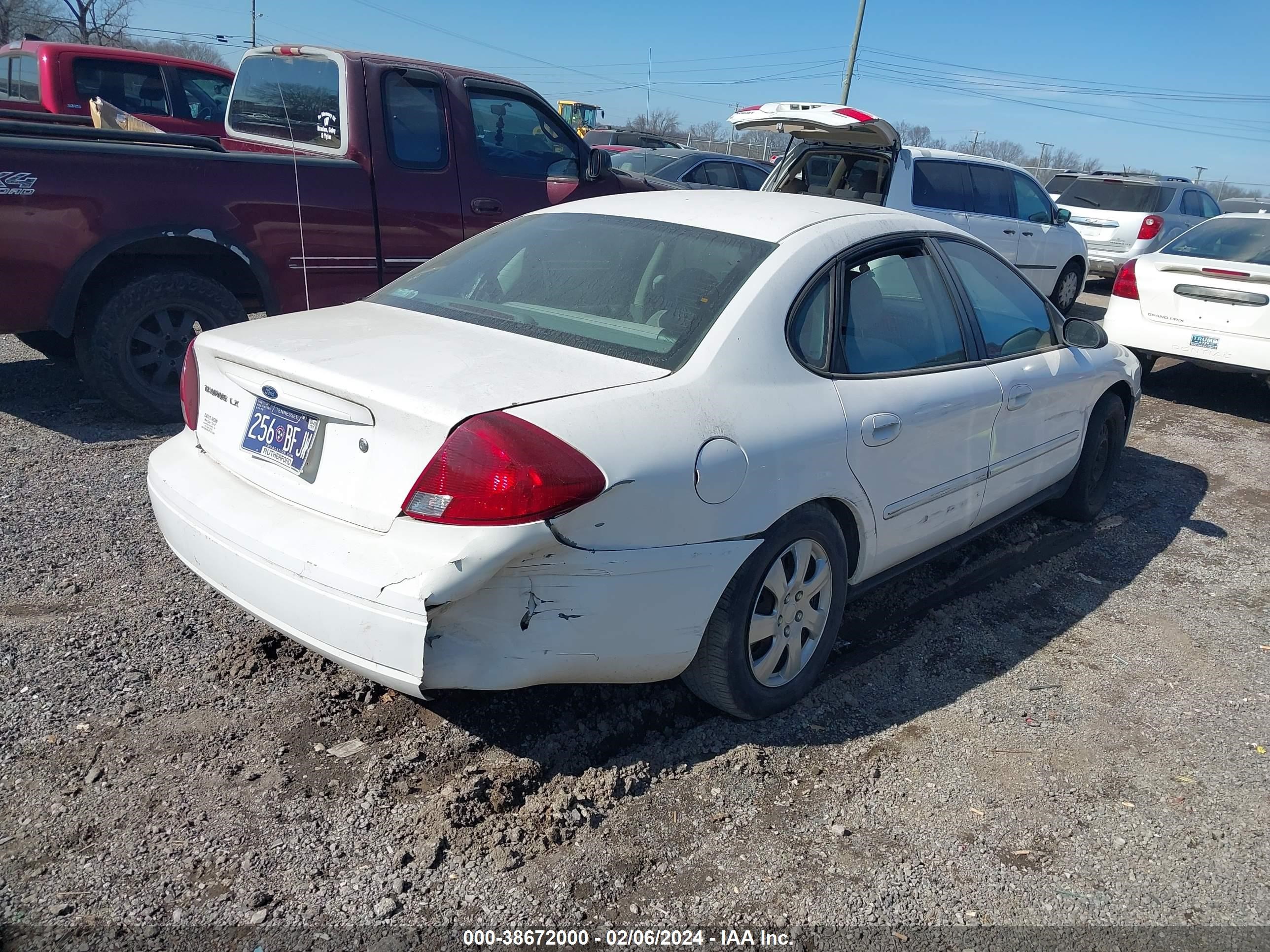 Photo 3 VIN: 1FAFP522X4A184953 - FORD TAURUS 