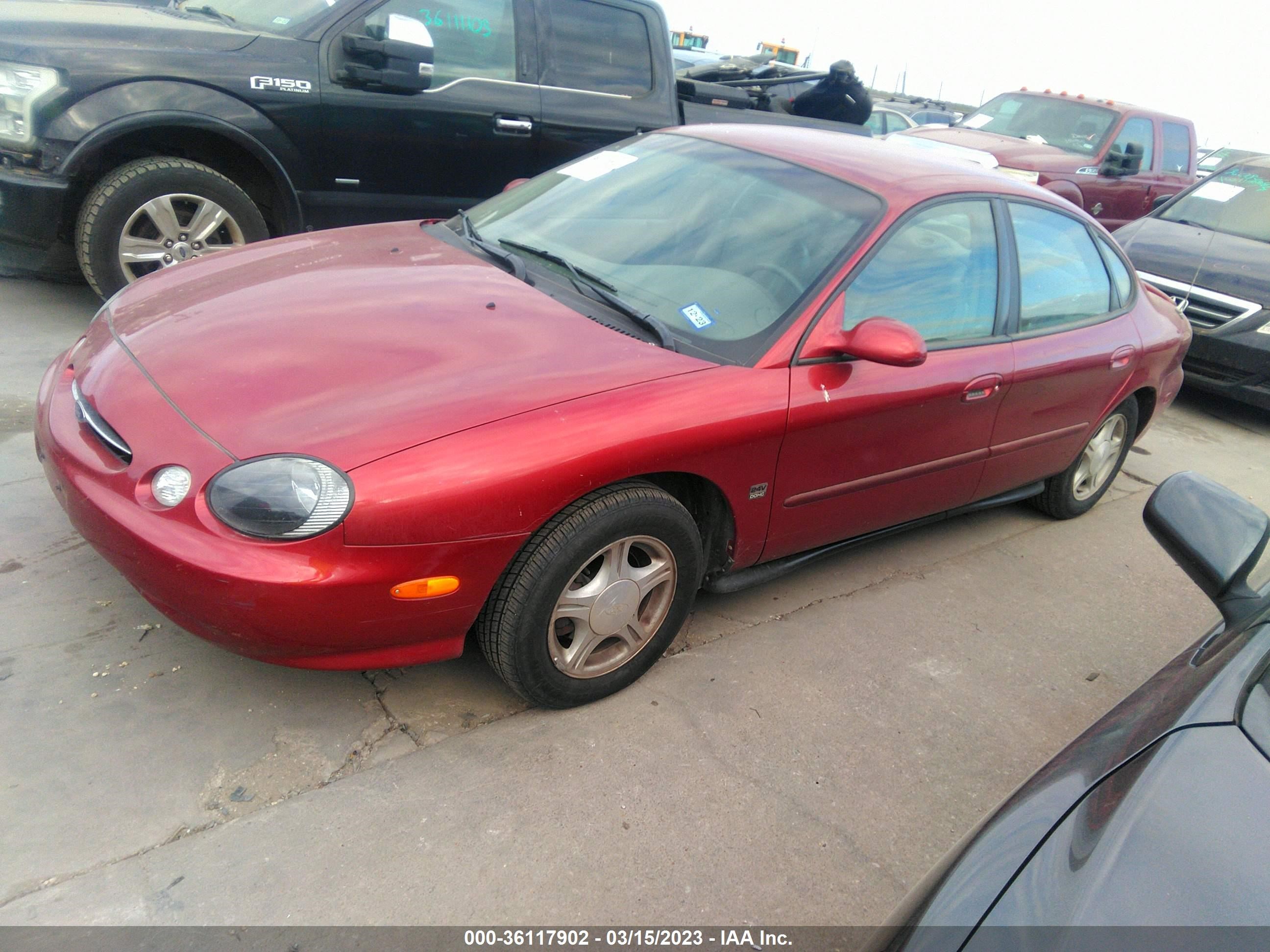 Photo 1 VIN: 1FAFP53S4XA164703 - FORD TAURUS 