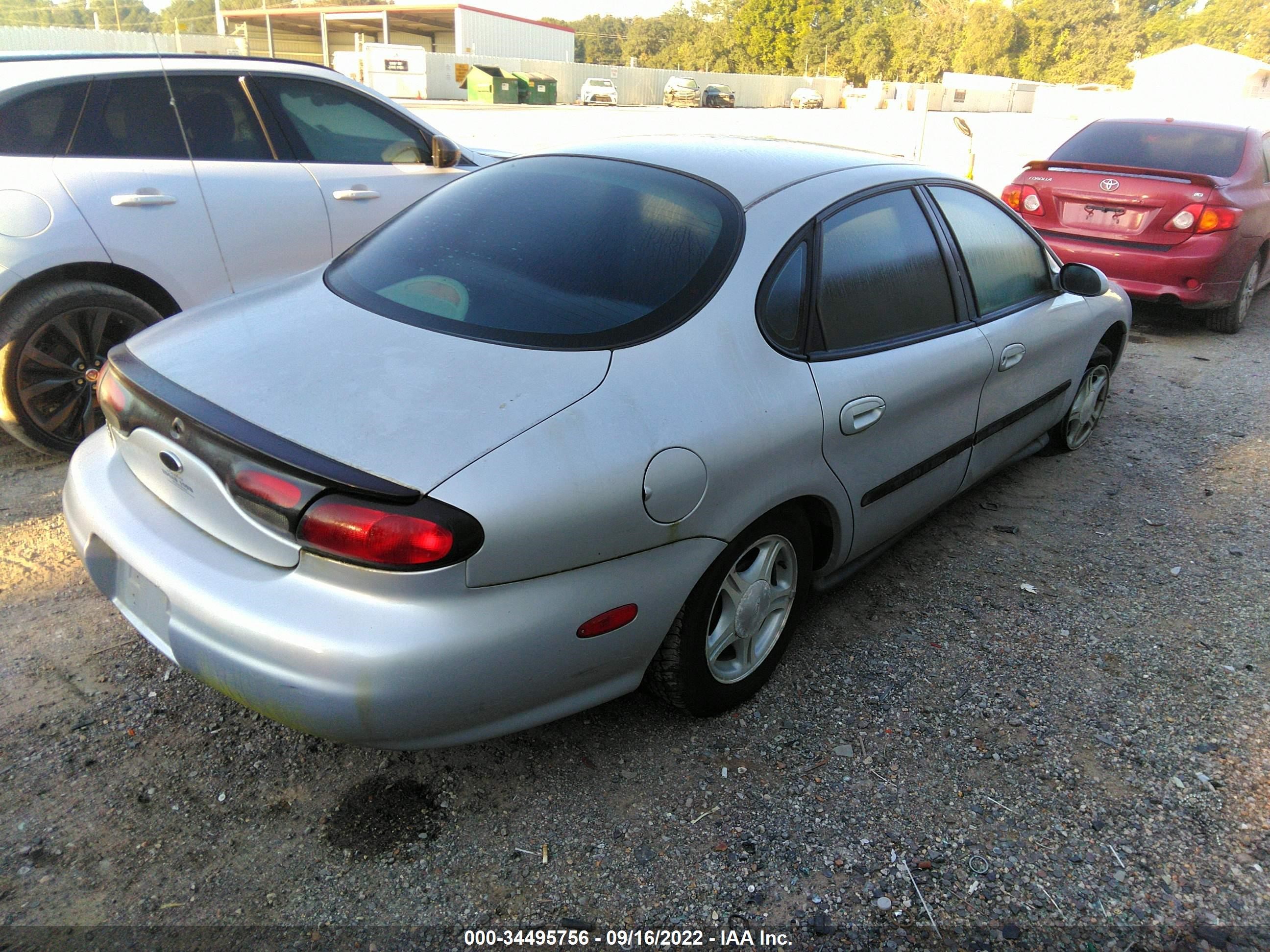 Photo 4 VIN: 1FAFP53U1XA229377 - FORD TAURUS 