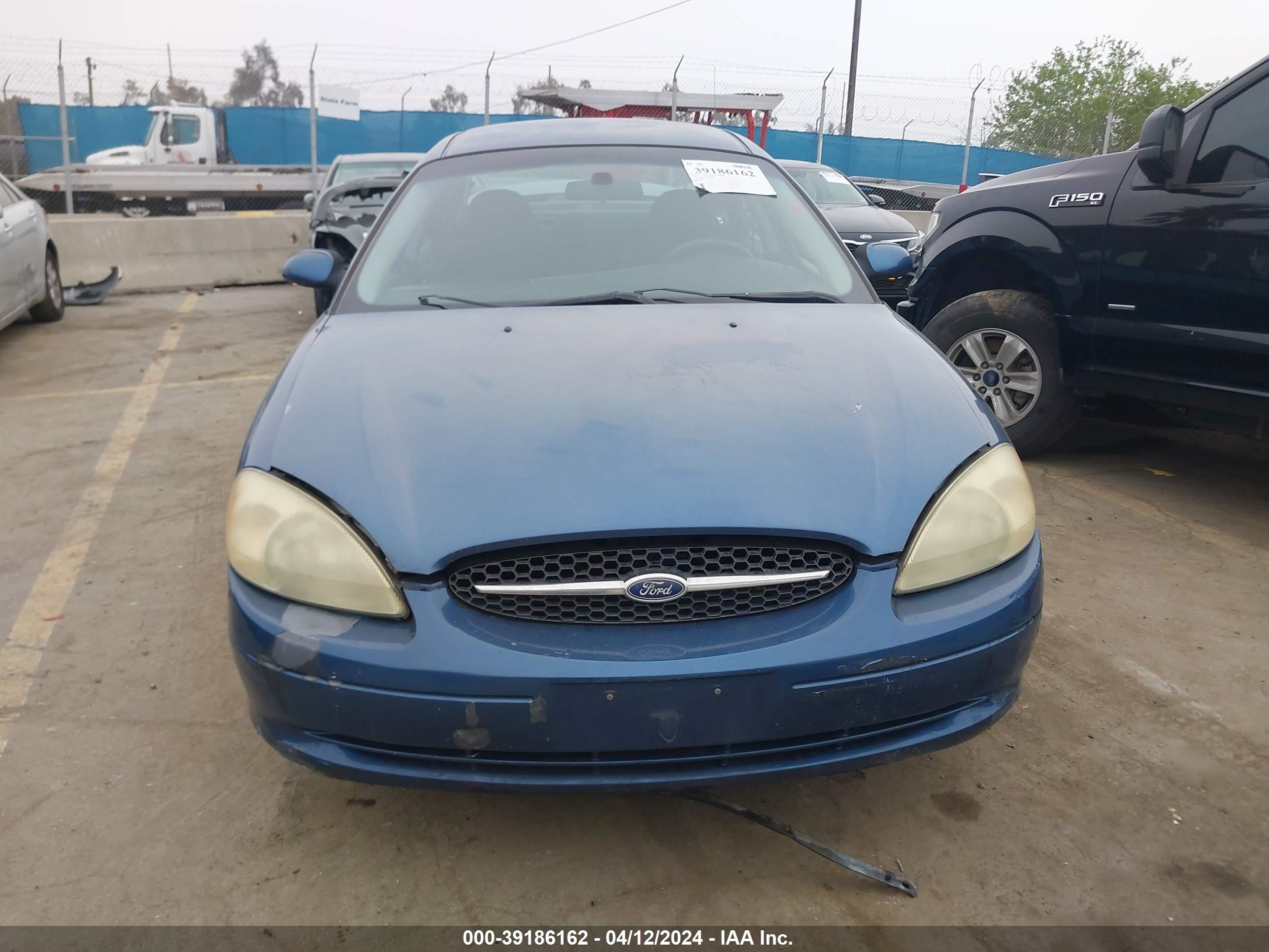 Photo 11 VIN: 1FAFP53U92G252671 - FORD TAURUS 