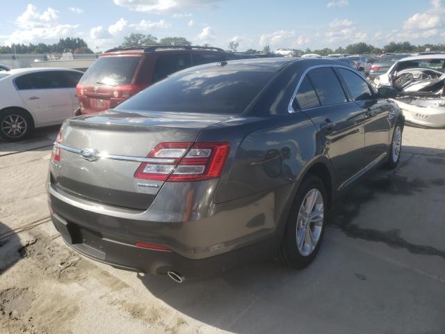 Photo 3 VIN: 1FAHP2D80GG145301 - FORD TAURUS SE 