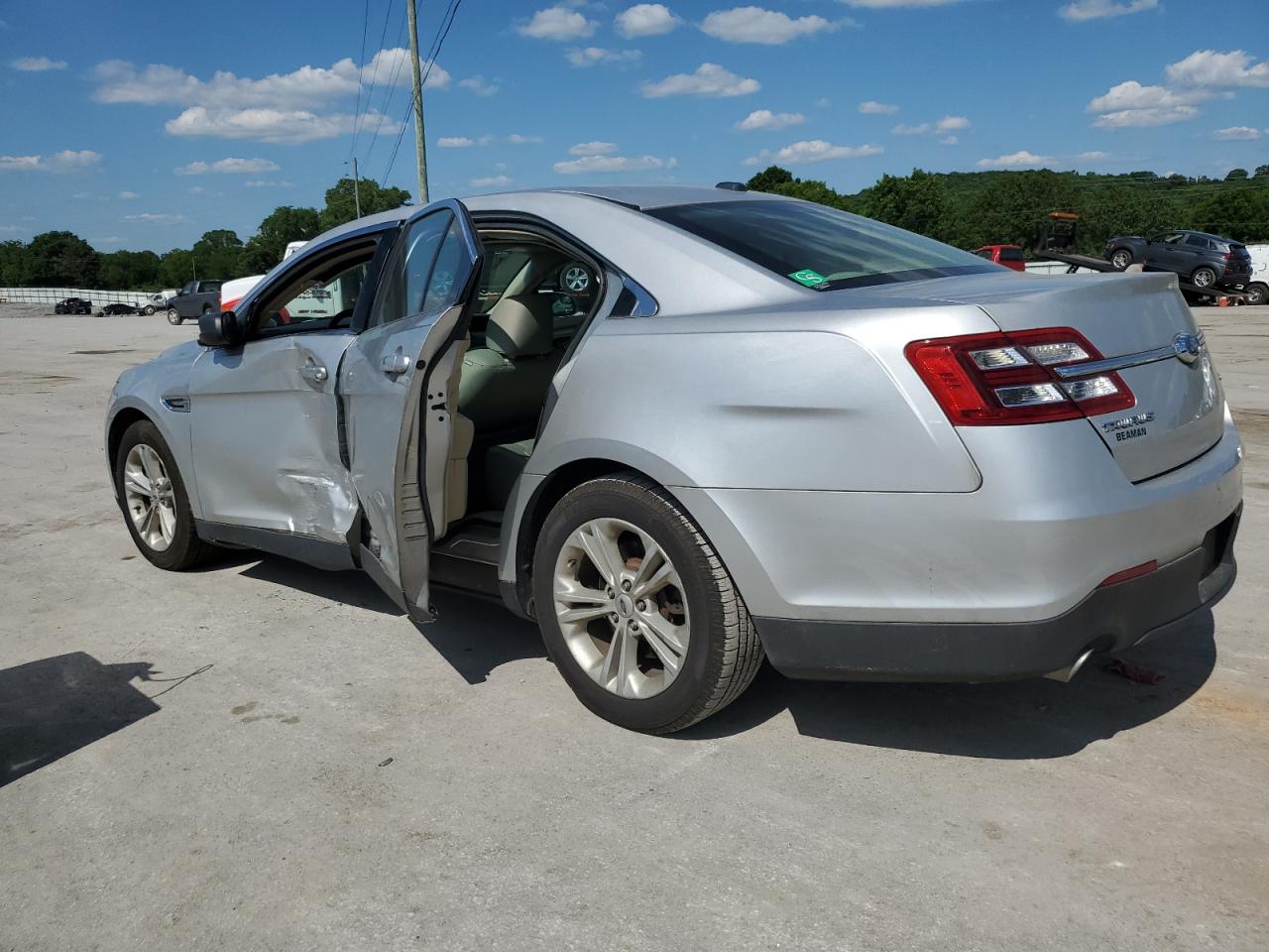 Photo 1 VIN: 1FAHP2D83JG115300 - FORD TAURUS 