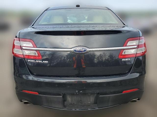 Photo 5 VIN: 1FAHP2E83DG104428 - FORD TAURUS 