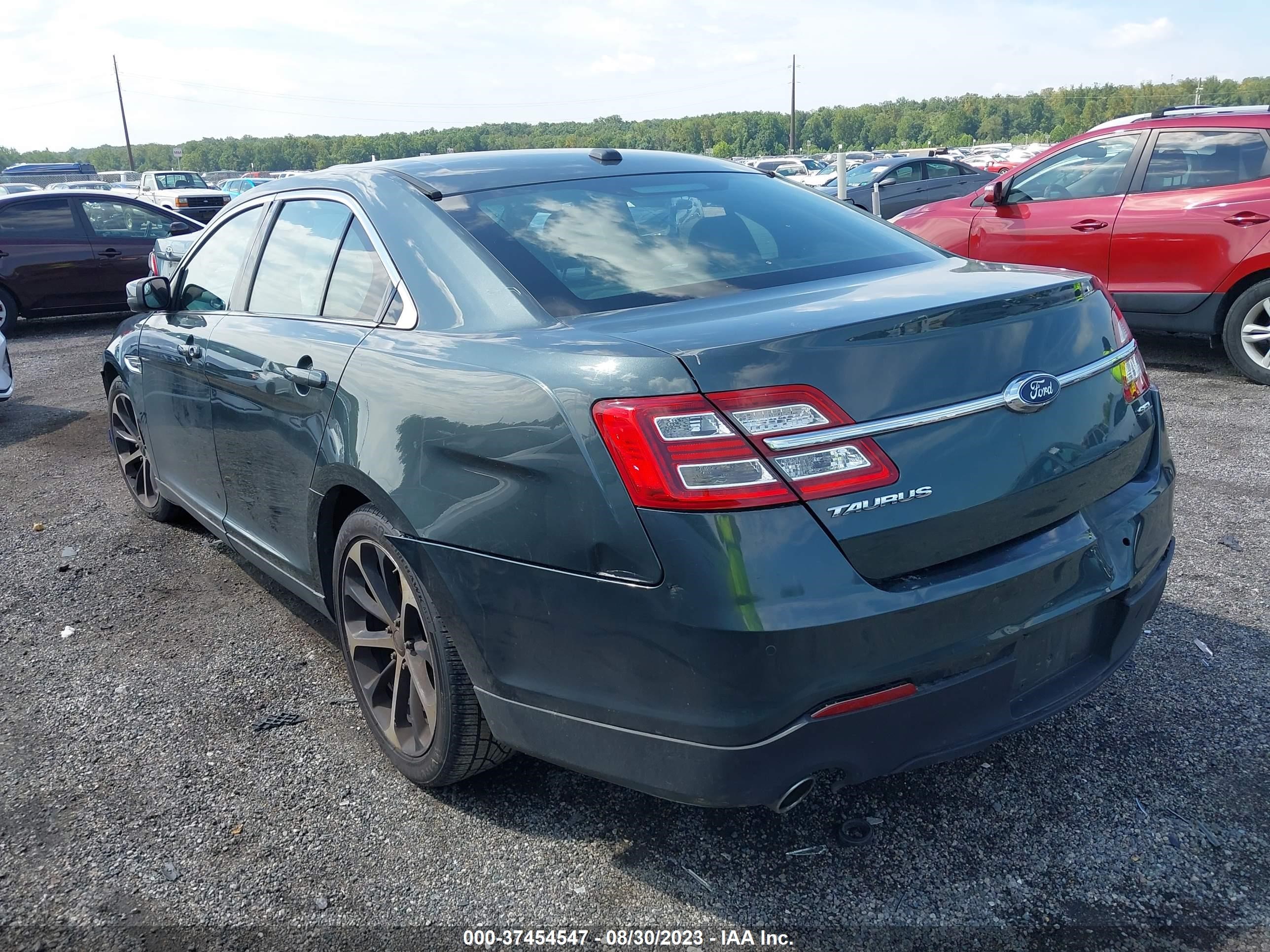 Photo 2 VIN: 1FAHP2E84GG123087 - FORD TAURUS 