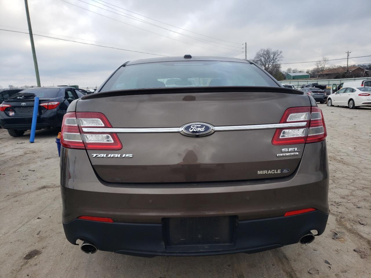 Photo 5 VIN: 1FAHP2E85GG155935 - FORD TAURUS 