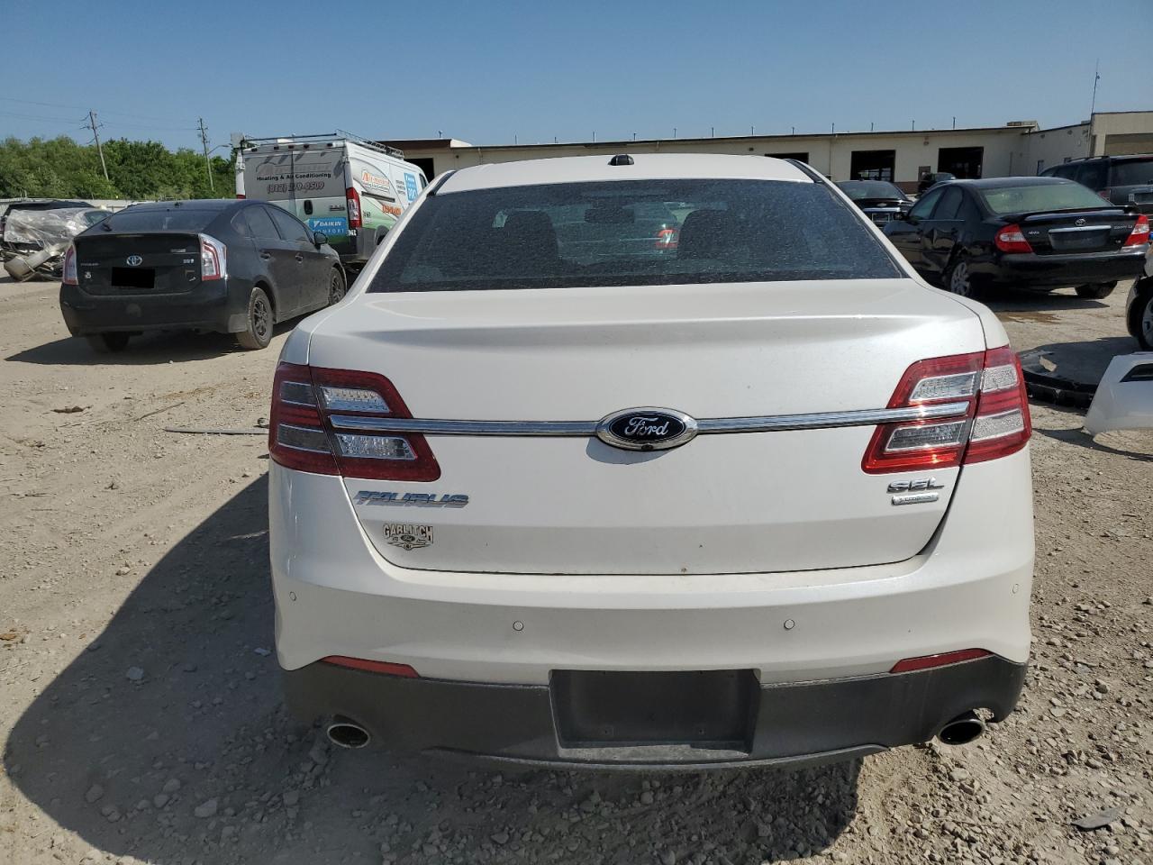 Photo 5 VIN: 1FAHP2E86HG110505 - FORD TAURUS 