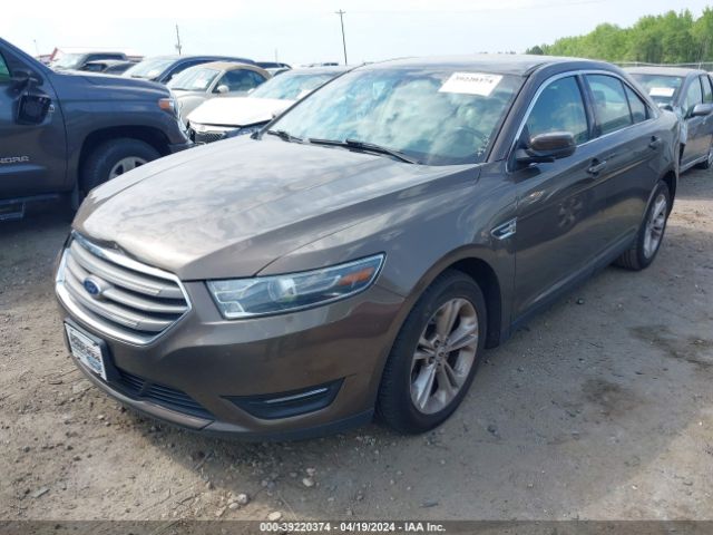 Photo 1 VIN: 1FAHP2E87GG100323 - FORD TAURUS 