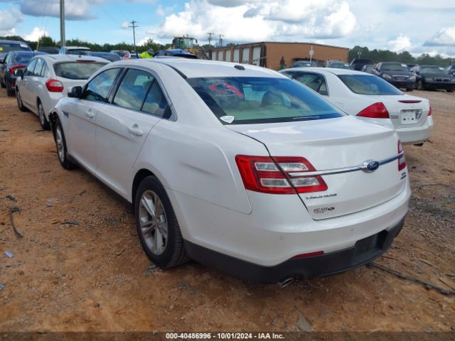 Photo 2 VIN: 1FAHP2E87JG124810 - FORD TAURUS 