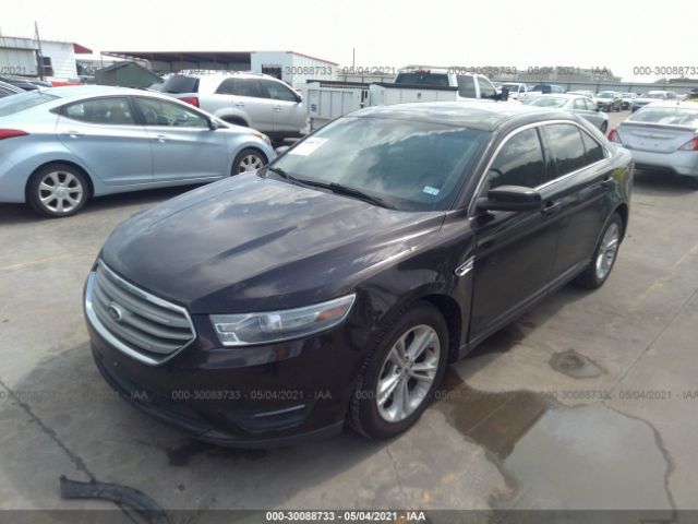 Photo 1 VIN: 1FAHP2E8XDG210410 - FORD TAURUS 