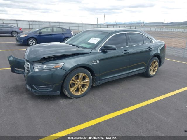 Photo 1 VIN: 1FAHP2E8XGG129783 - FORD TAURUS 