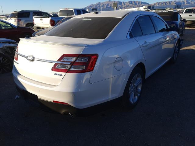 Photo 3 VIN: 1FAHP2E8XGG141741 - FORD TAURUS SEL 