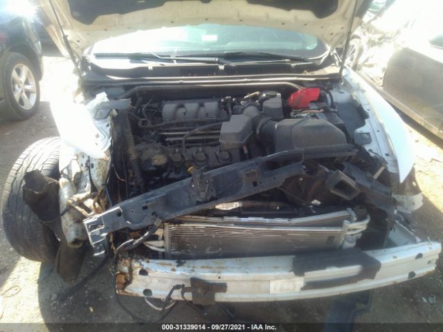 Photo 9 VIN: 1FAHP2E8XGG146907 - FORD TAURUS 