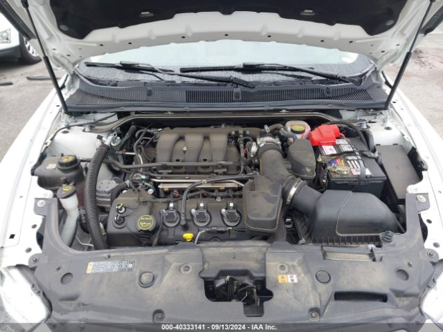 Photo 9 VIN: 1FAHP2E8XKG100194 - FORD TAURUS 