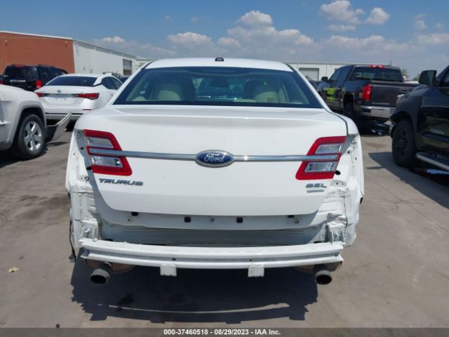 Photo 5 VIN: 1FAHP2E99DG223013 - FORD TAURUS 