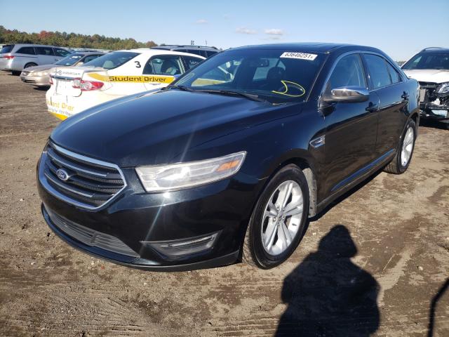 Photo 1 VIN: 1FAHP2F80FG104730 - FORD TAURUS LIM 