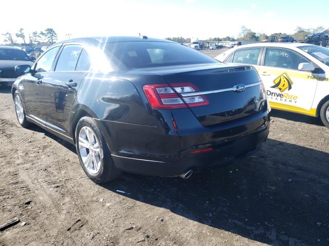 Photo 2 VIN: 1FAHP2F80FG104730 - FORD TAURUS LIM 