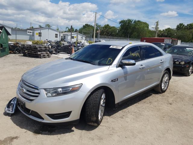 Photo 1 VIN: 1FAHP2F81GG111042 - FORD TAURUS LIM 