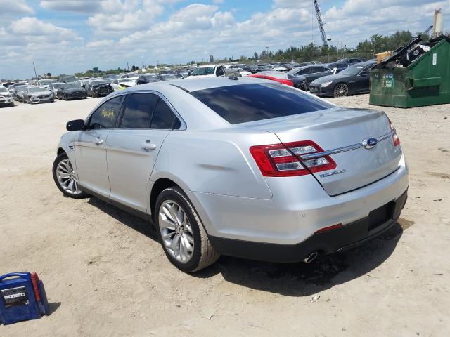 Photo 2 VIN: 1FAHP2F81GG111042 - FORD TAURUS LIM 