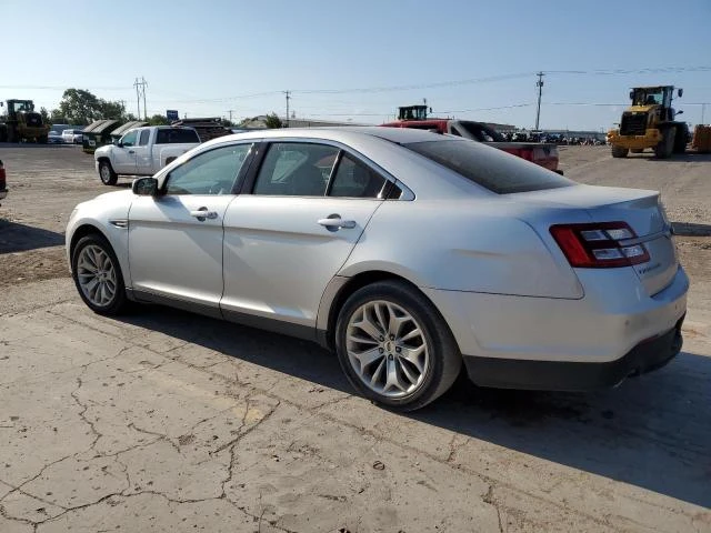 Photo 1 VIN: 1FAHP2F83GG113942 - FORD TAURUS LIM 