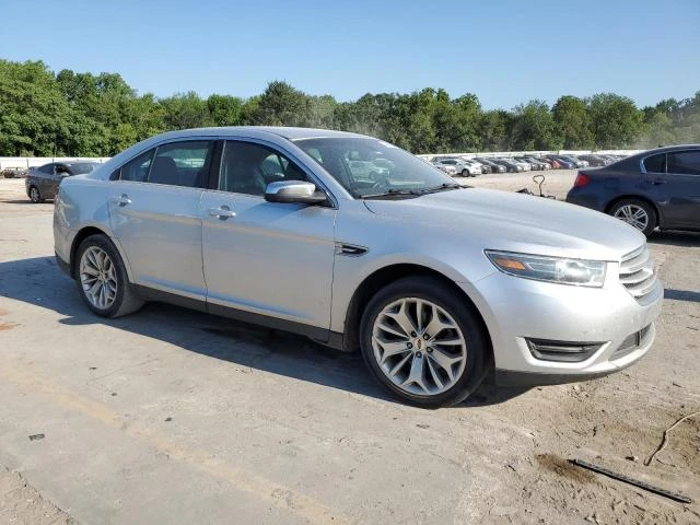 Photo 3 VIN: 1FAHP2F83GG113942 - FORD TAURUS LIM 