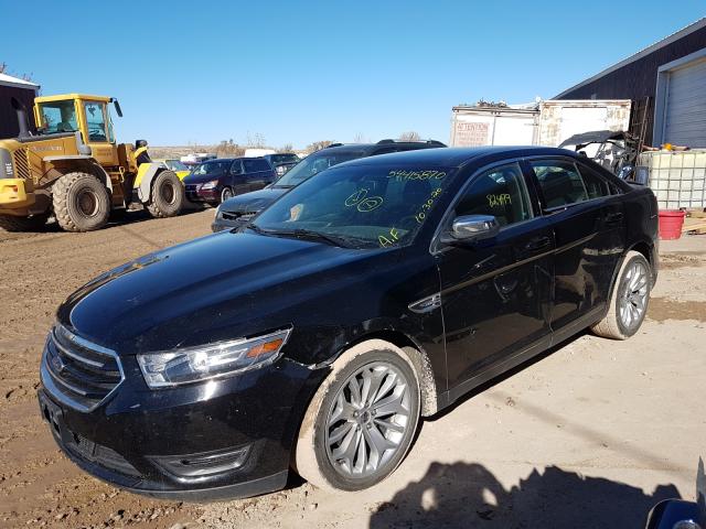 Photo 1 VIN: 1FAHP2F84GG132029 - FORD TAURUS LIM 