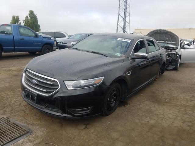 Photo 1 VIN: 1FAHP2F84KG109813 - FORD TAURUS LIM 