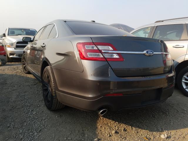 Photo 2 VIN: 1FAHP2F85GG103087 - FORD TAURUS LIM 