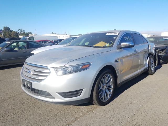 Photo 1 VIN: 1FAHP2F89GG105120 - FORD TAURUS LIM 