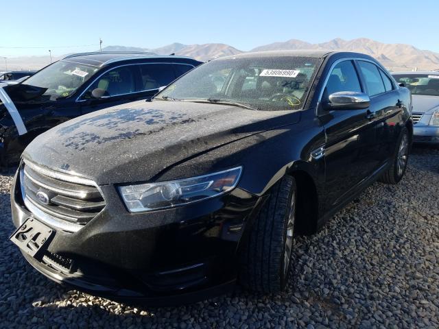 Photo 1 VIN: 1FAHP2F8XGG113047 - FORD TAURUS 