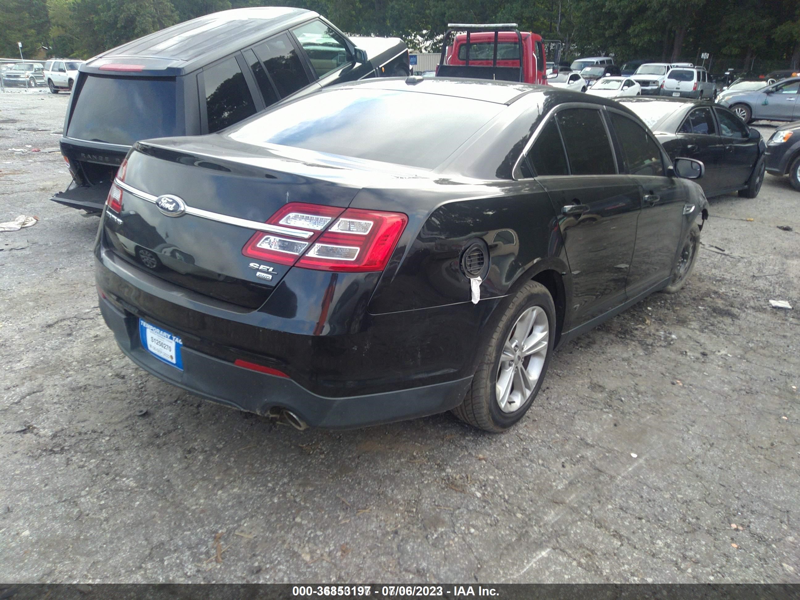 Photo 3 VIN: 1FAHP2H87DG164918 - FORD TAURUS 