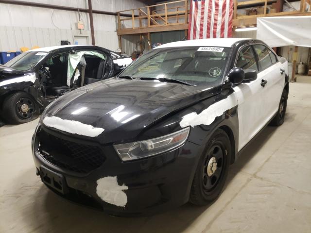 Photo 1 VIN: 1FAHP2L80DG142993 - FORD TAURUS POL 