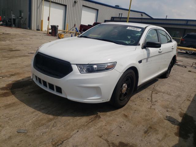 Photo 1 VIN: 1FAHP2L80JG143640 - FORD TAURUS POL 