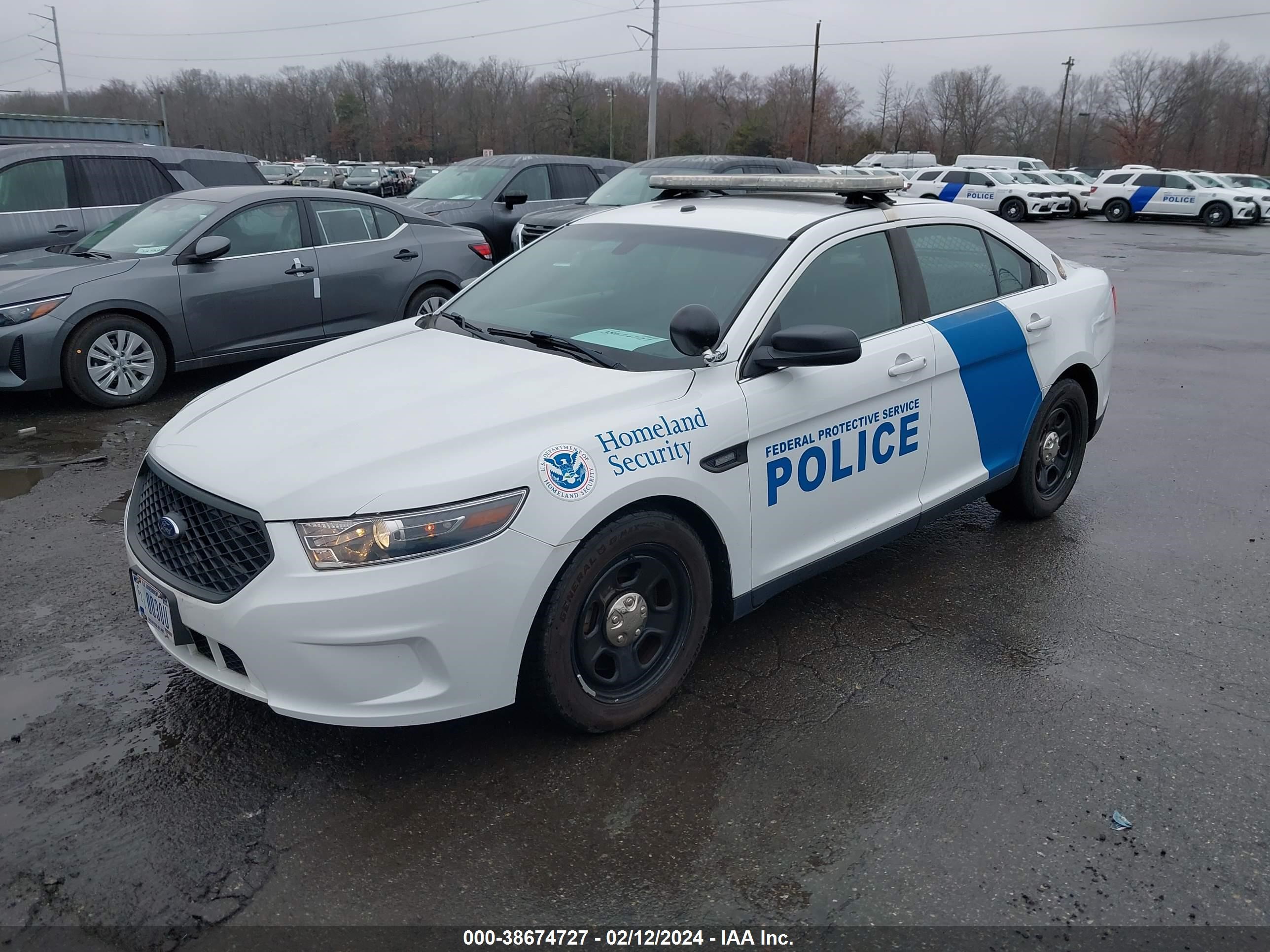 Photo 1 VIN: 1FAHP2L83HG109203 - FORD POLICE 