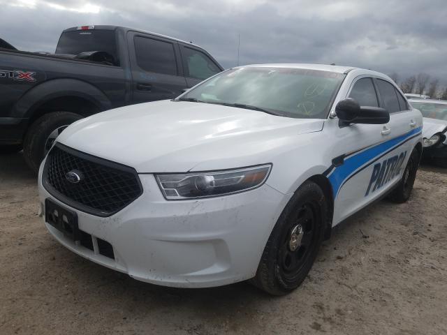 Photo 1 VIN: 1FAHP2L83JG119123 - FORD TAURUS POL 