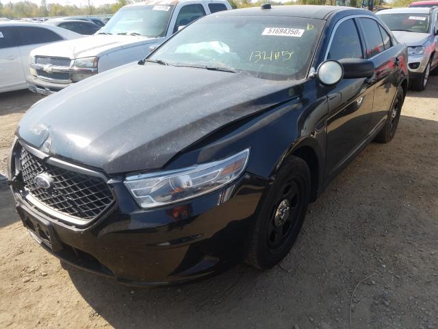 Photo 1 VIN: 1FAHP2L85DG132105 - FORD TAURUS POL 