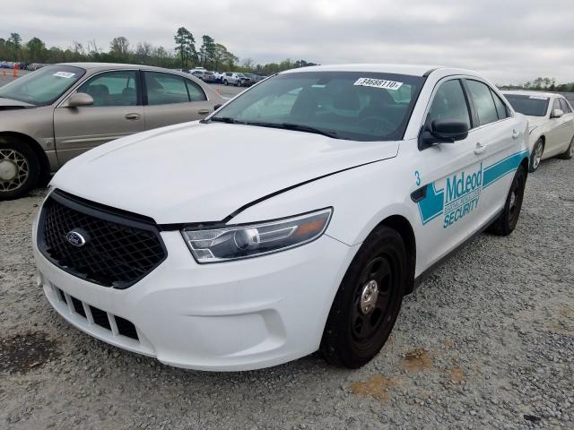 Photo 1 VIN: 1FAHP2L85GG154691 - FORD TAURUS POL 