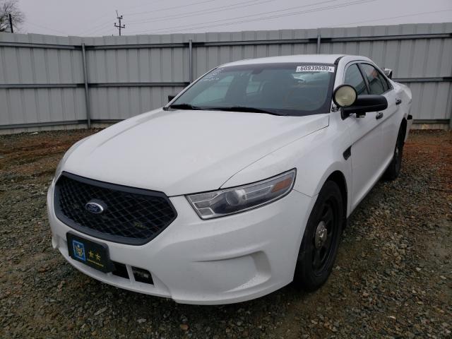 Photo 1 VIN: 1FAHP2L86DG100165 - FORD TAURUS POL 