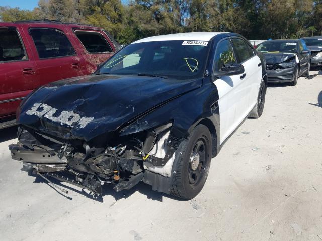 Photo 1 VIN: 1FAHP2L89EG170258 - FORD TAURUS POL 